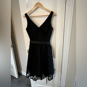 Black Morilee knee length bridesmaid dress, lace with ribbon
